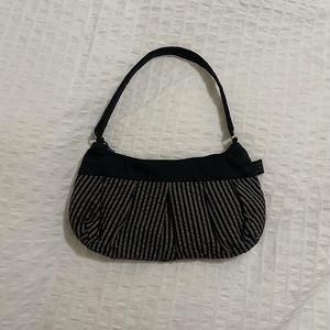 Small black striped shoulder bag